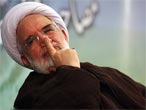 کروبی:احمدی نژاد مشکوک است